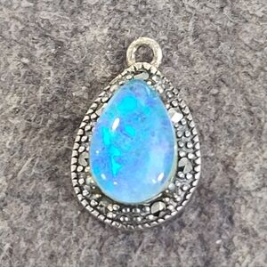 Blue Opal Teardrop Pendant In Sterling Silver Mount SLC